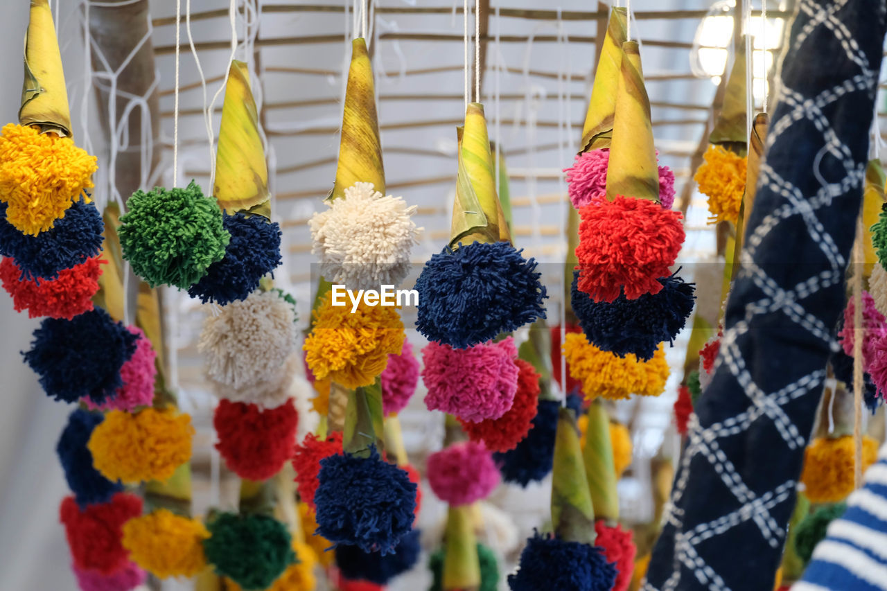 Multi colored flowers for sale at market stall