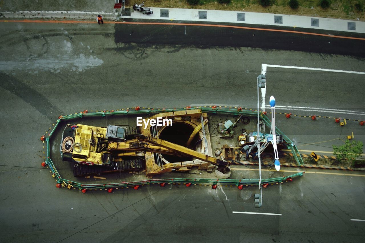 High angle view of earth mover at road construction site