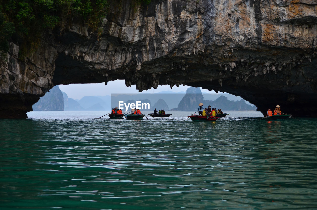 People on boat in sea at ha long bay