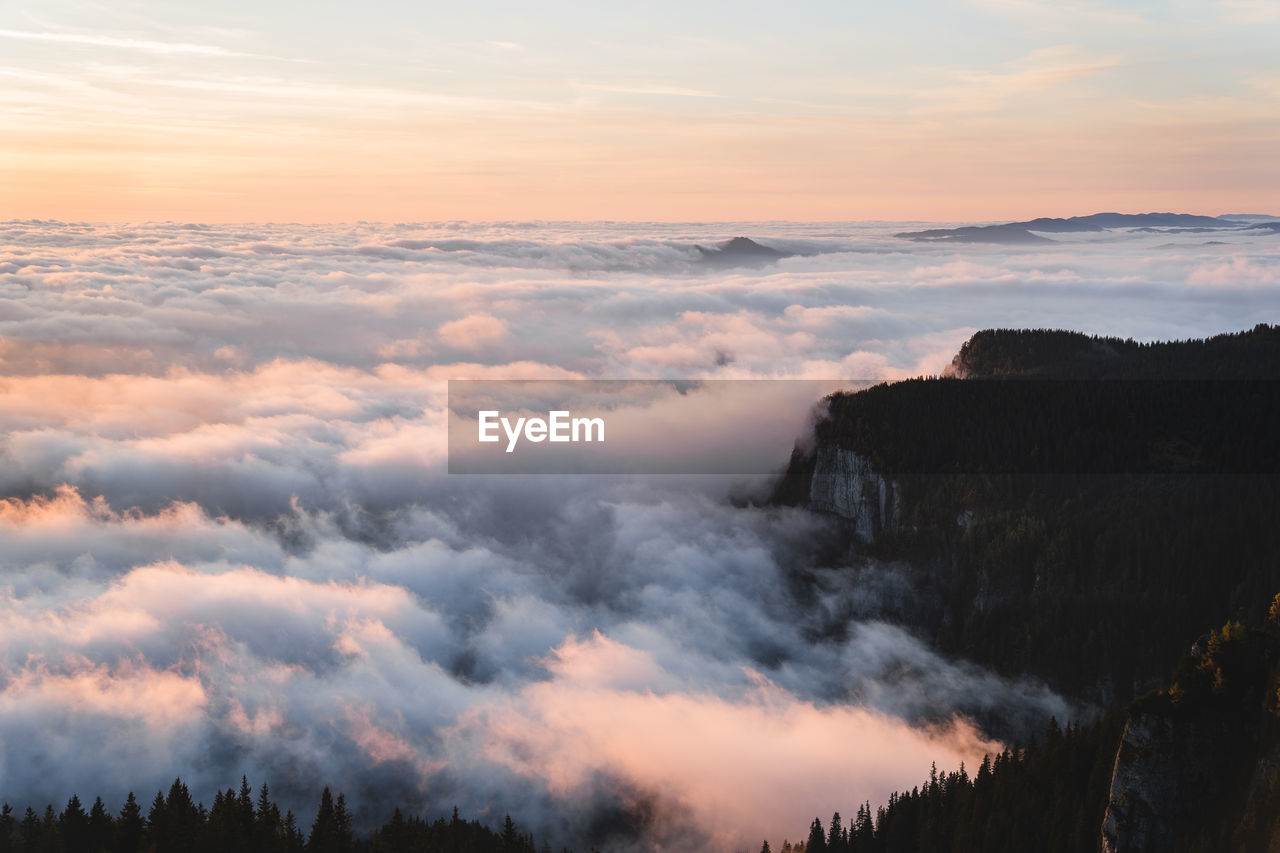 SCENIC VIEW OF CLOUDS DURING SUNSET