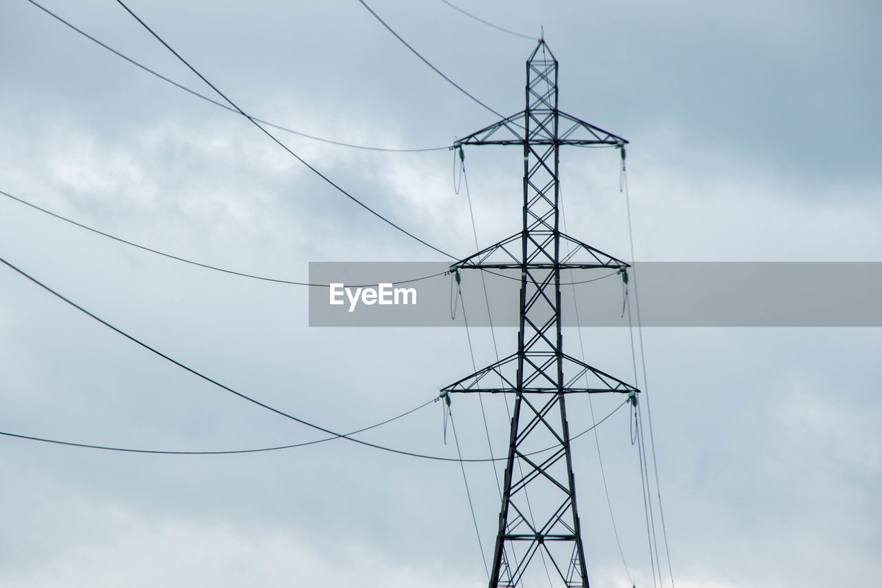 LOW ANGLE VIEW OF POWER LINE AGAINST SKY