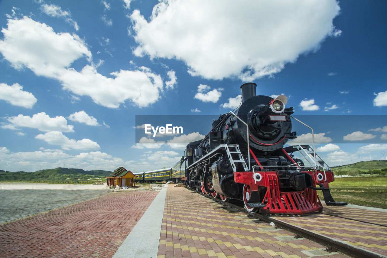 Low angle view of train against sky