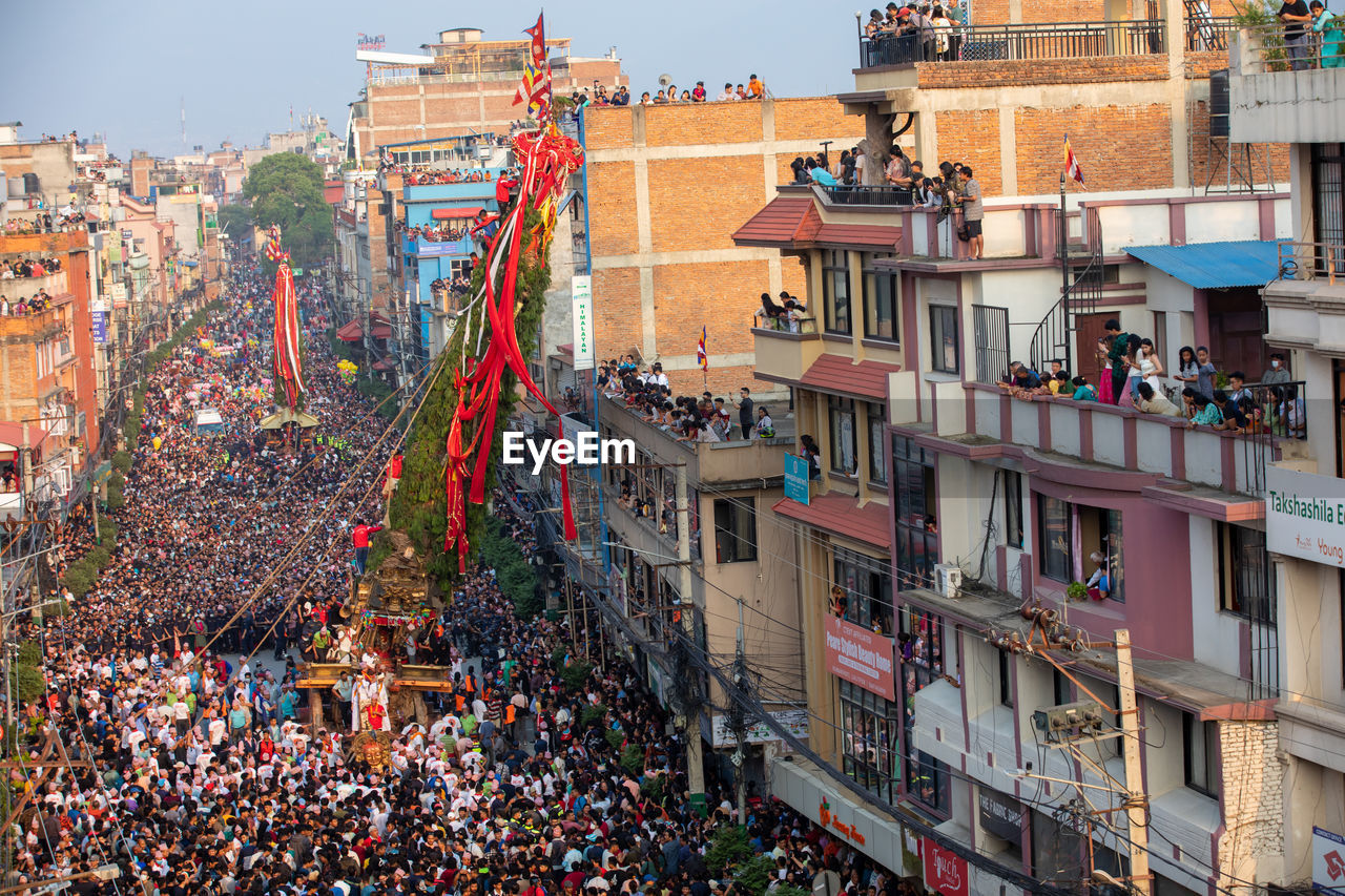 Devotees pull chariots as they take part in the festivities to mark the rato machindranath chariot.
