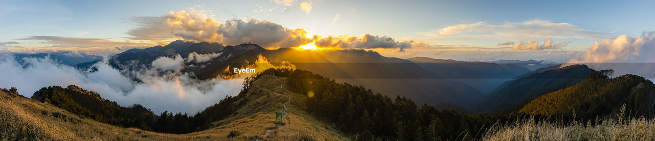 Panoramic view of mountains against sky during sunset