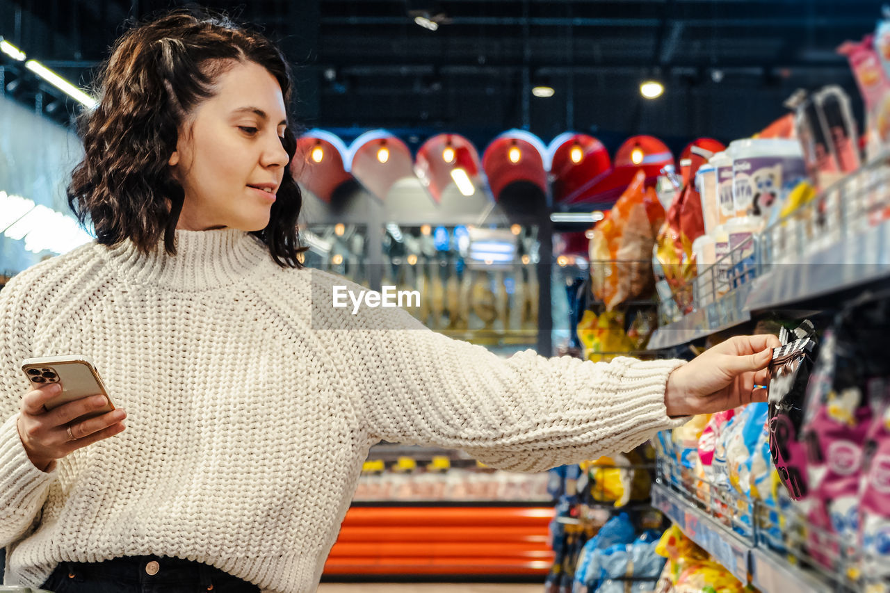 young woman using smart phone