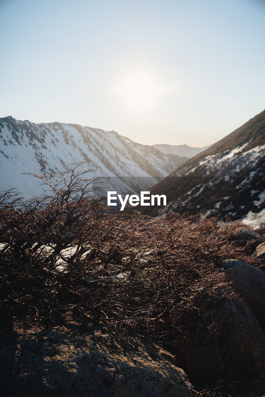 SCENIC VIEW OF MOUNTAIN AGAINST SKY