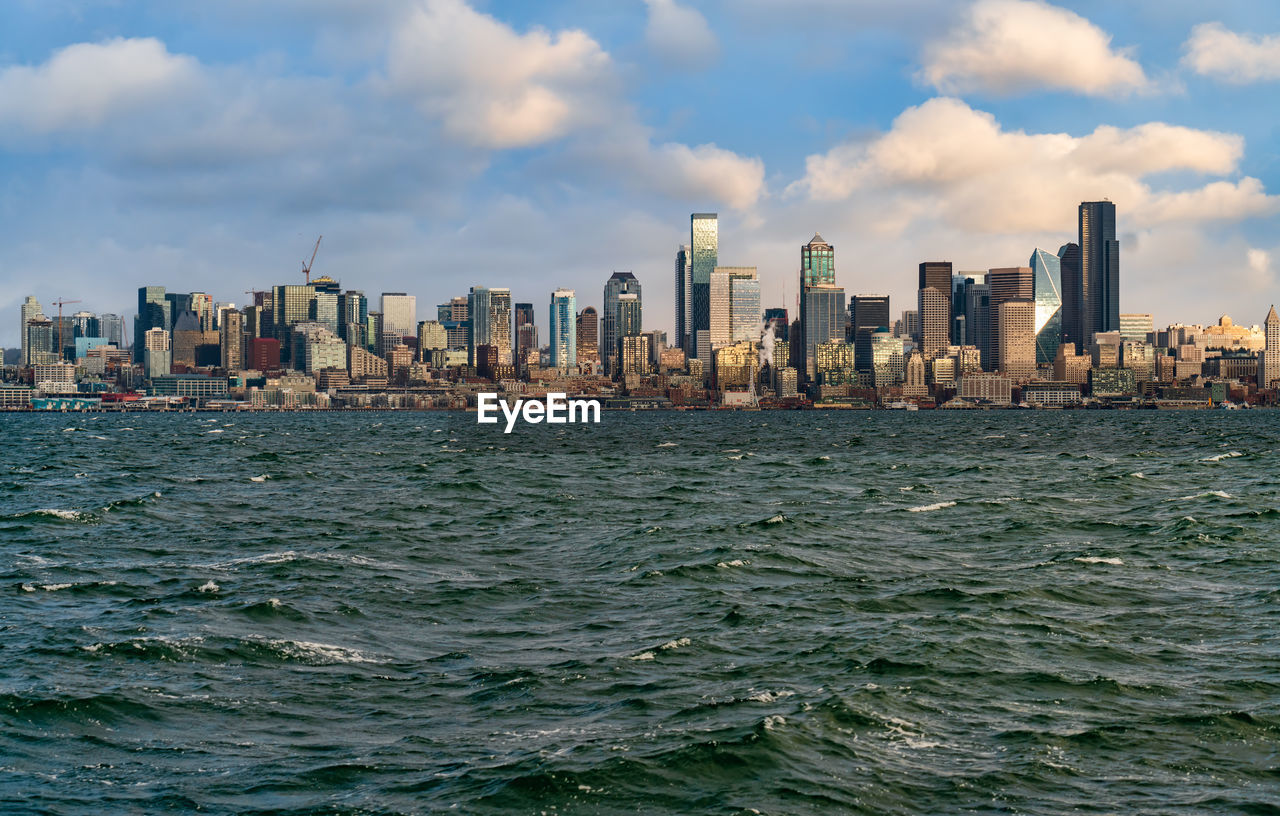 A view of the seattle skyline on a windy day.