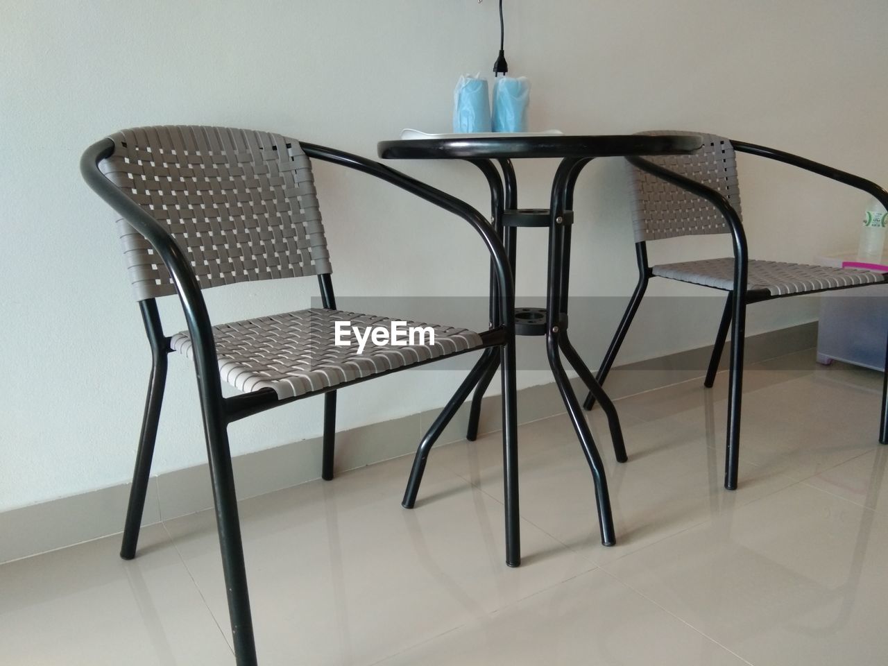 EMPTY CHAIRS AND TABLE AT HOME