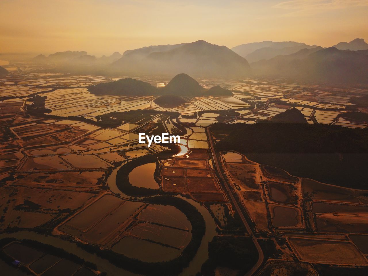 Scenic view of landscape against sky during sunset