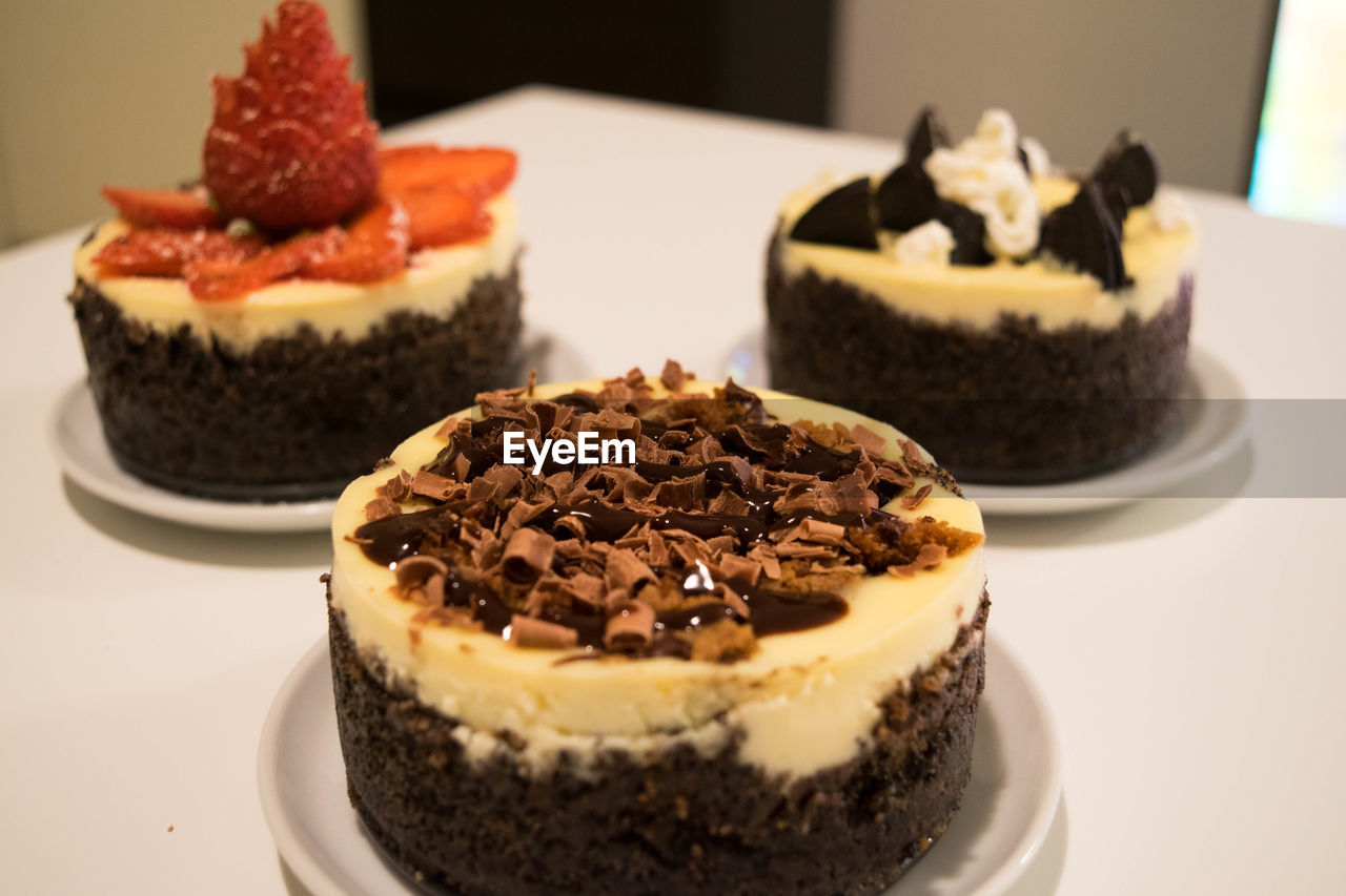 Close-up of served chocolate cheesecake on table