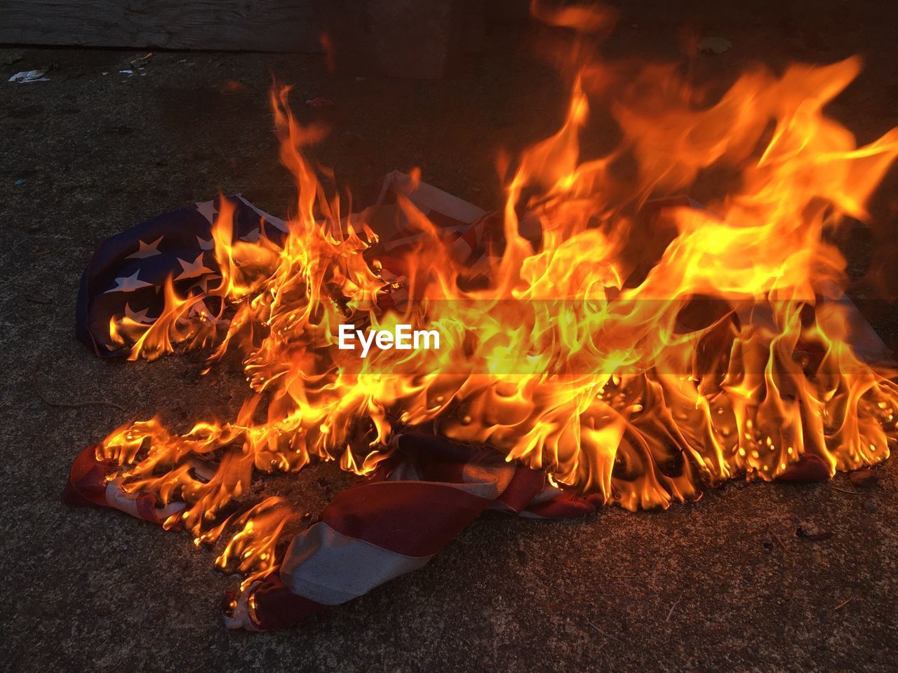 Close-up of burning flag