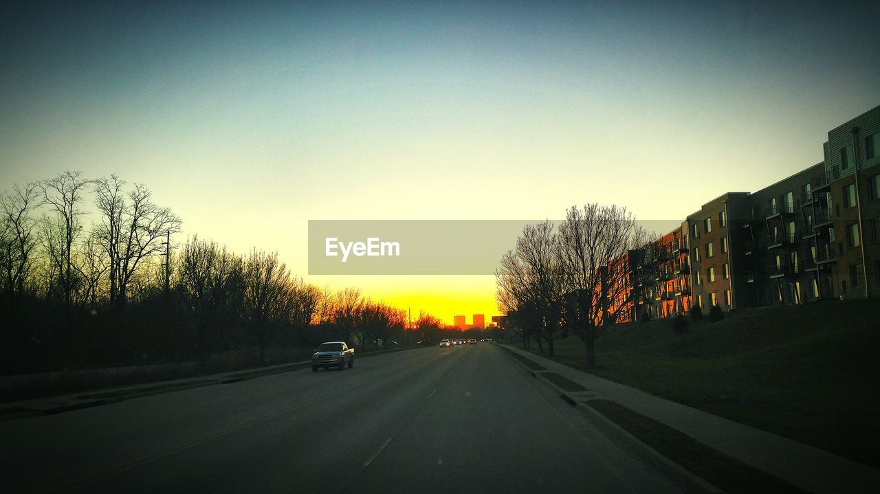 VIEW OF ROAD AT SUNSET