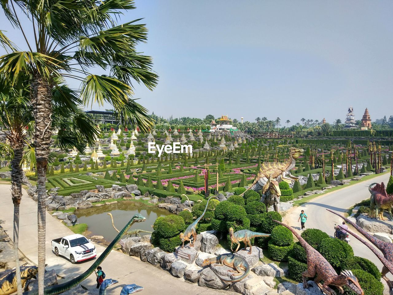 SCENIC VIEW OF PALM TREES AGAINST SKY