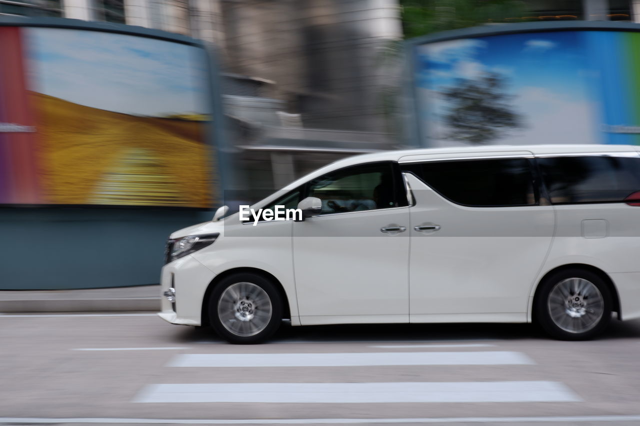 VIEW OF CAR ON ROAD