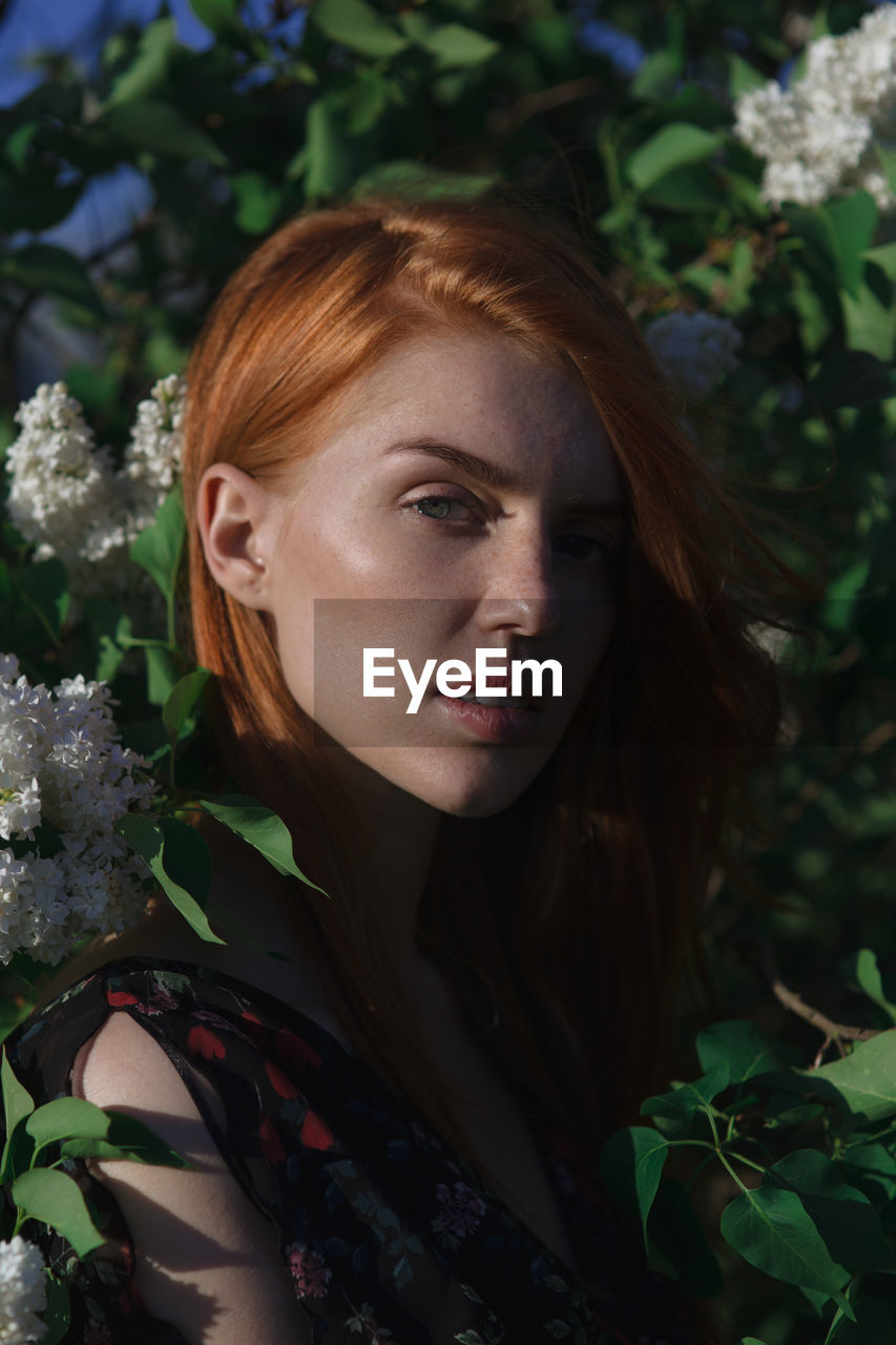 CLOSE-UP PORTRAIT OF YOUNG WOMAN WITH EYES CLOSED