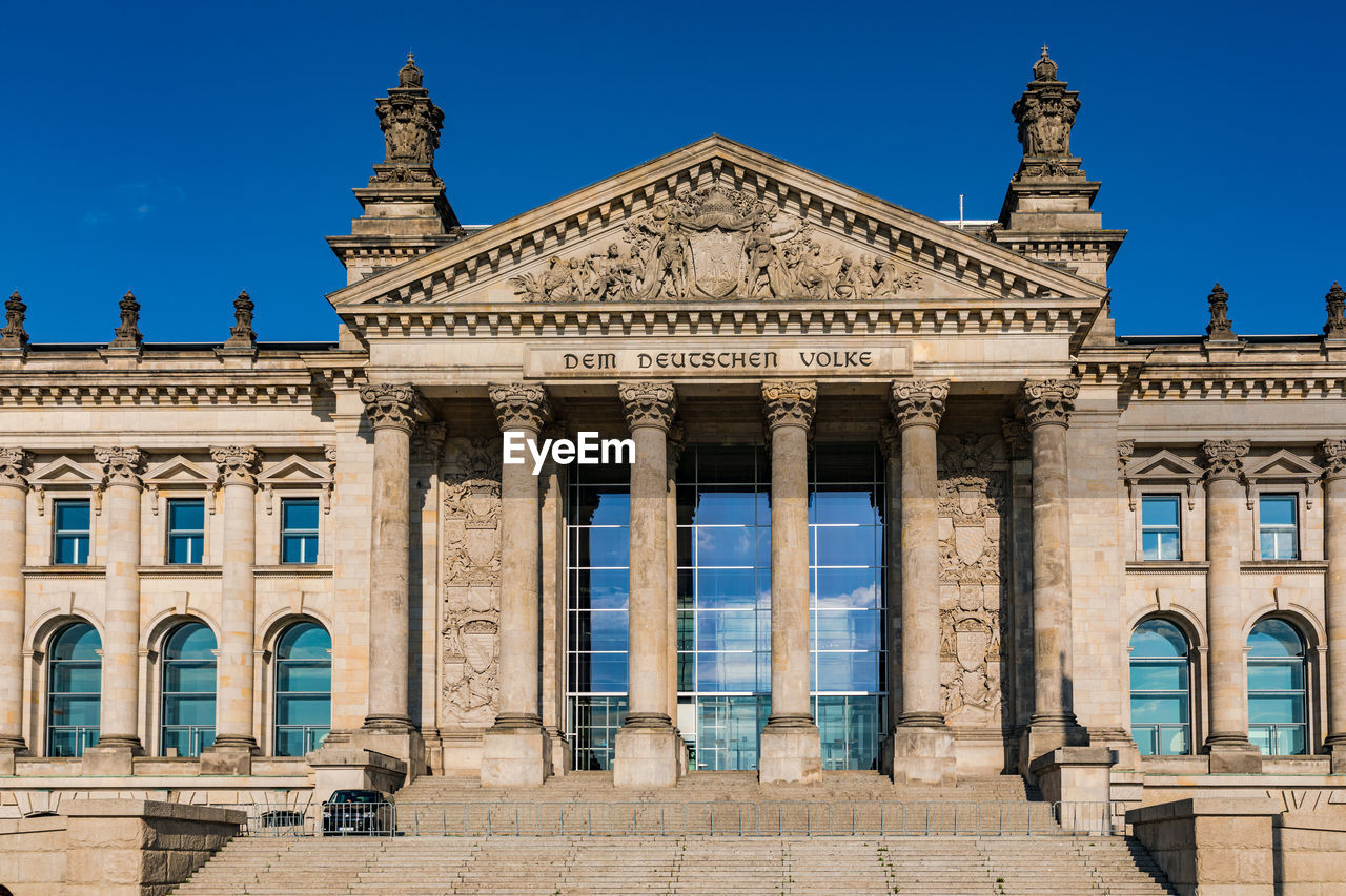 The view worth seeing from the square of the republic on the building of german reichstag in berlin