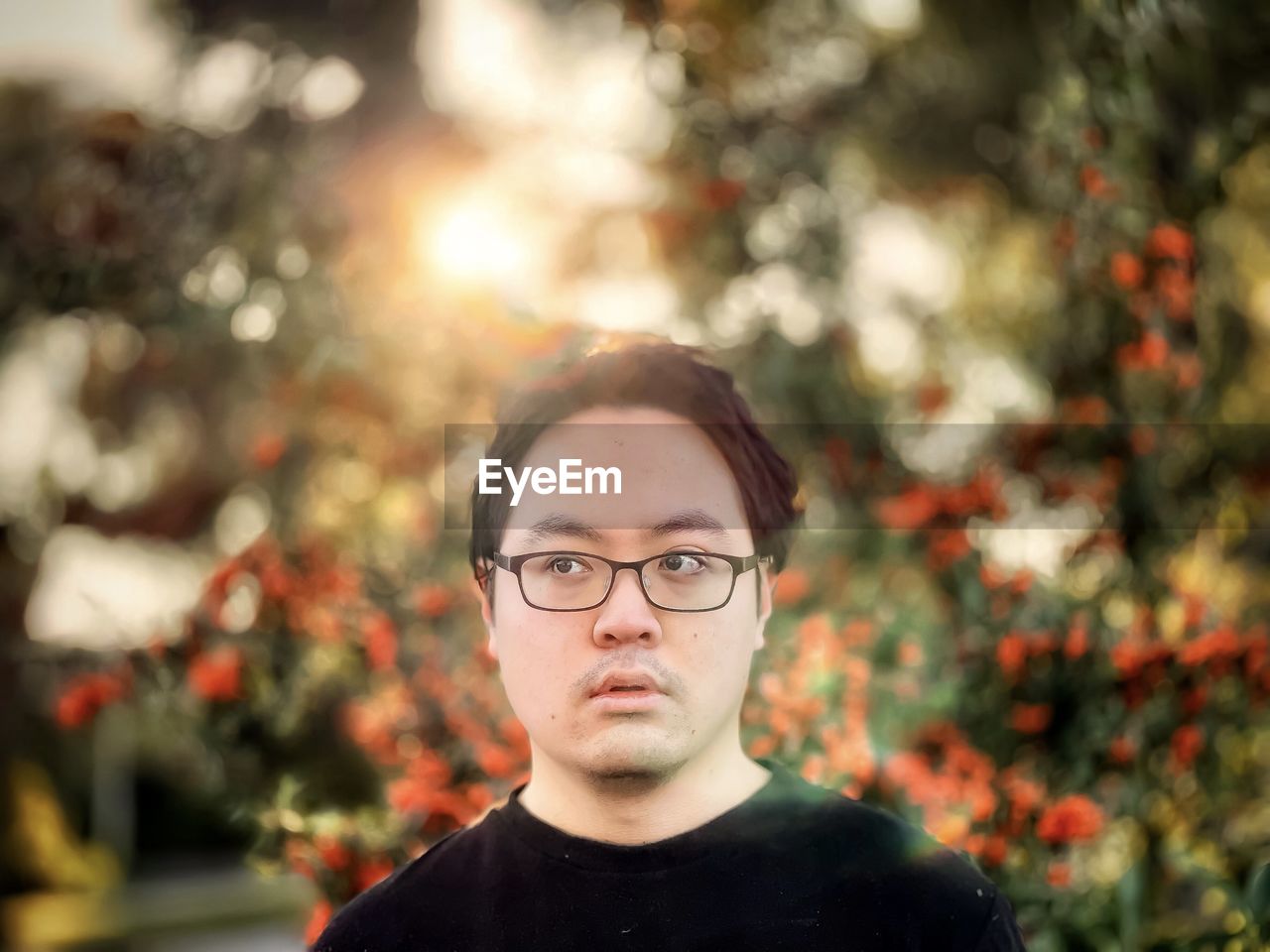 CLOSE-UP PORTRAIT OF MAN WITH EYEGLASSES