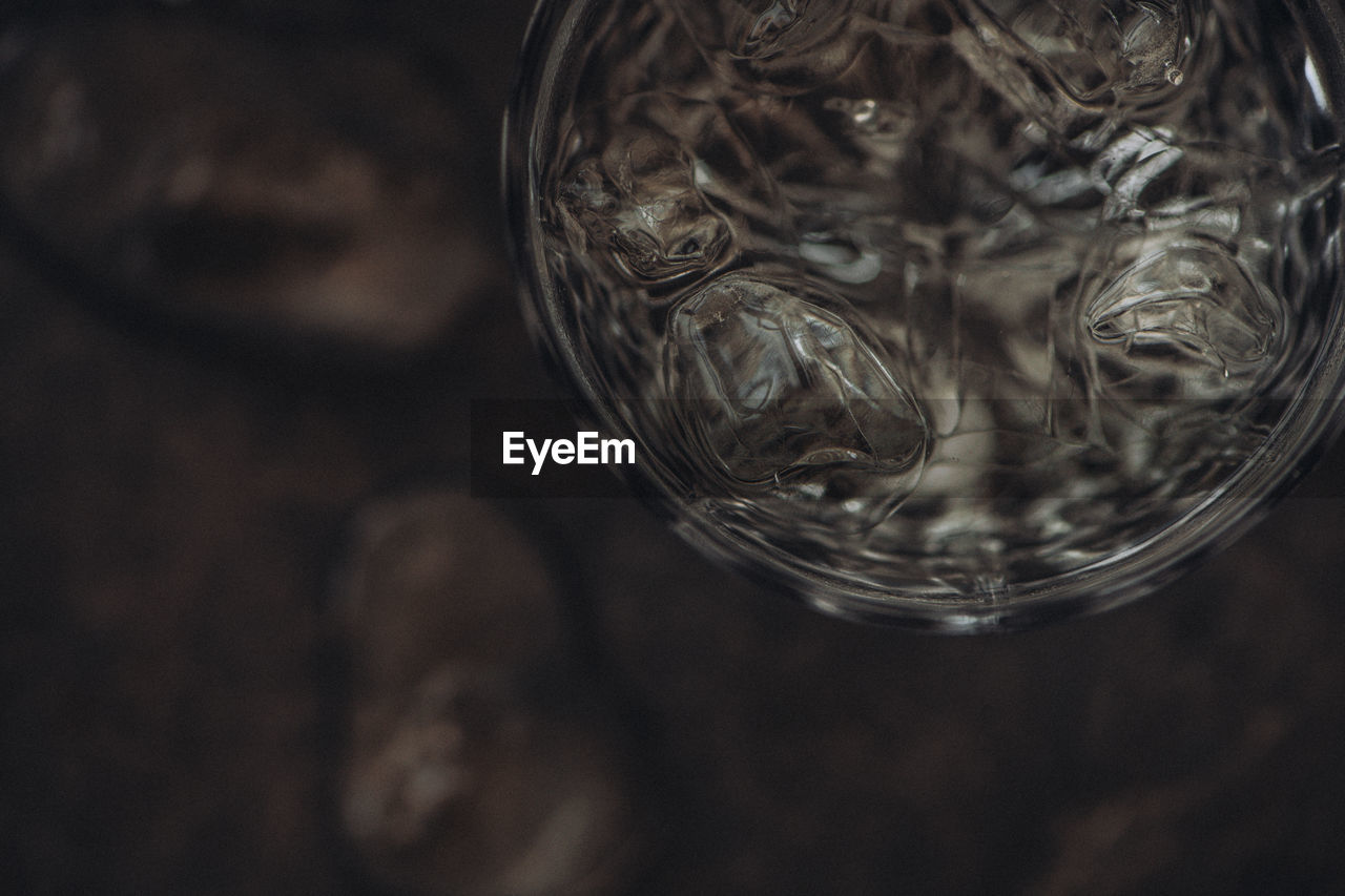 High angle view of water in glass jar on table