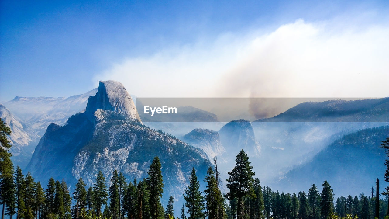 Scenic view of mountain range at yosemite national park against sky