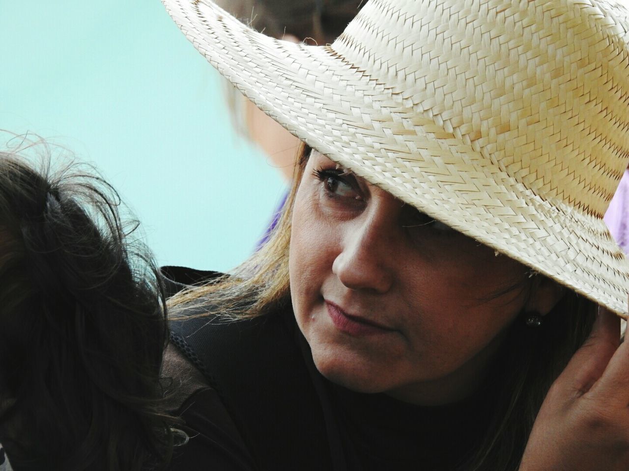 Close-up of woman in hat