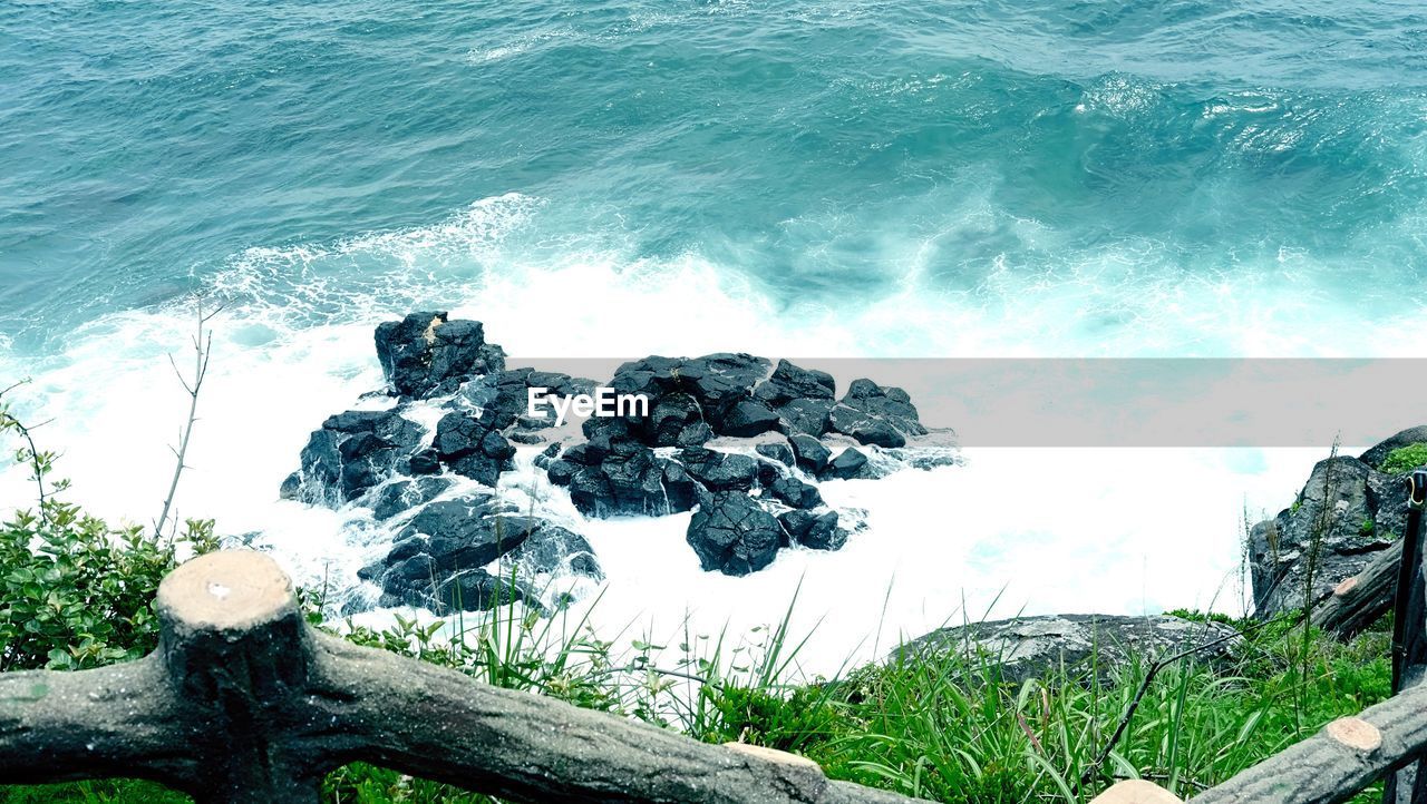 High angle view of sea on sunny day