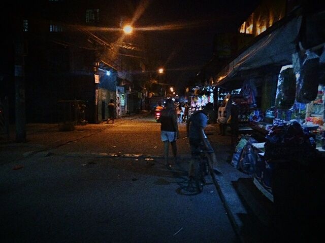 STREET LIGHT IN ILLUMINATED CITY