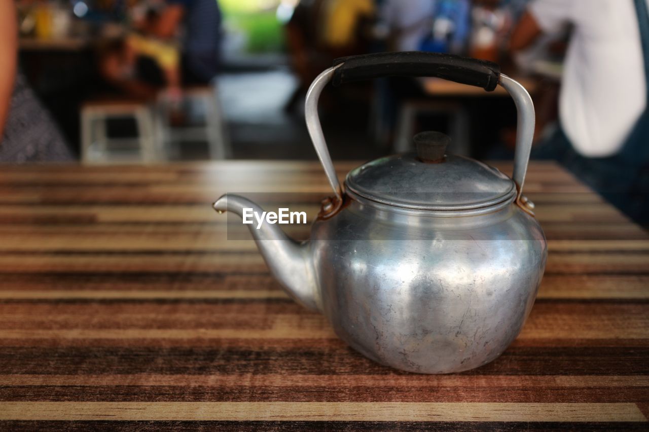 CLOSE-UP OF DRINK ON TABLE