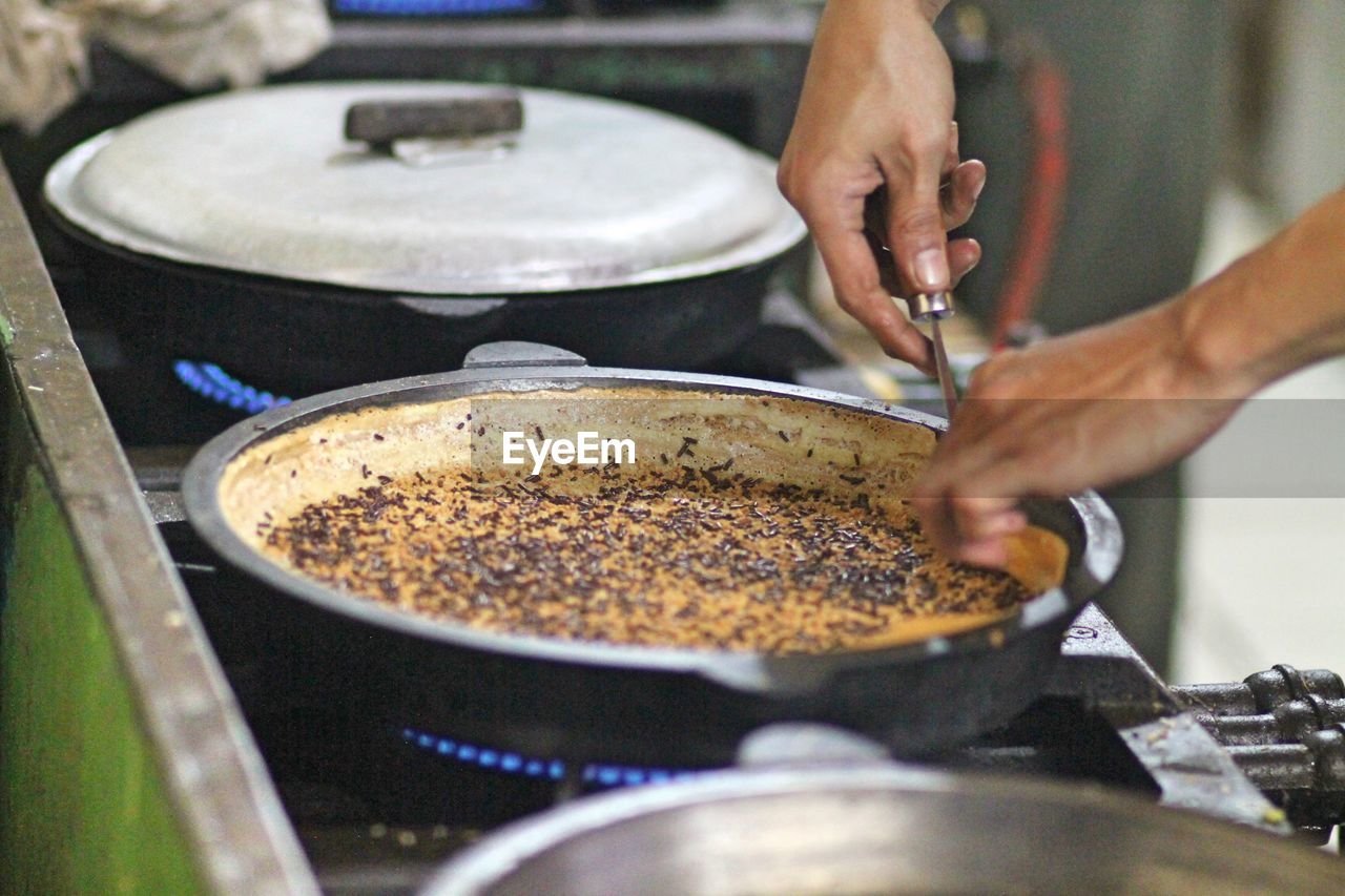 High angle of person preparing food at restaurant