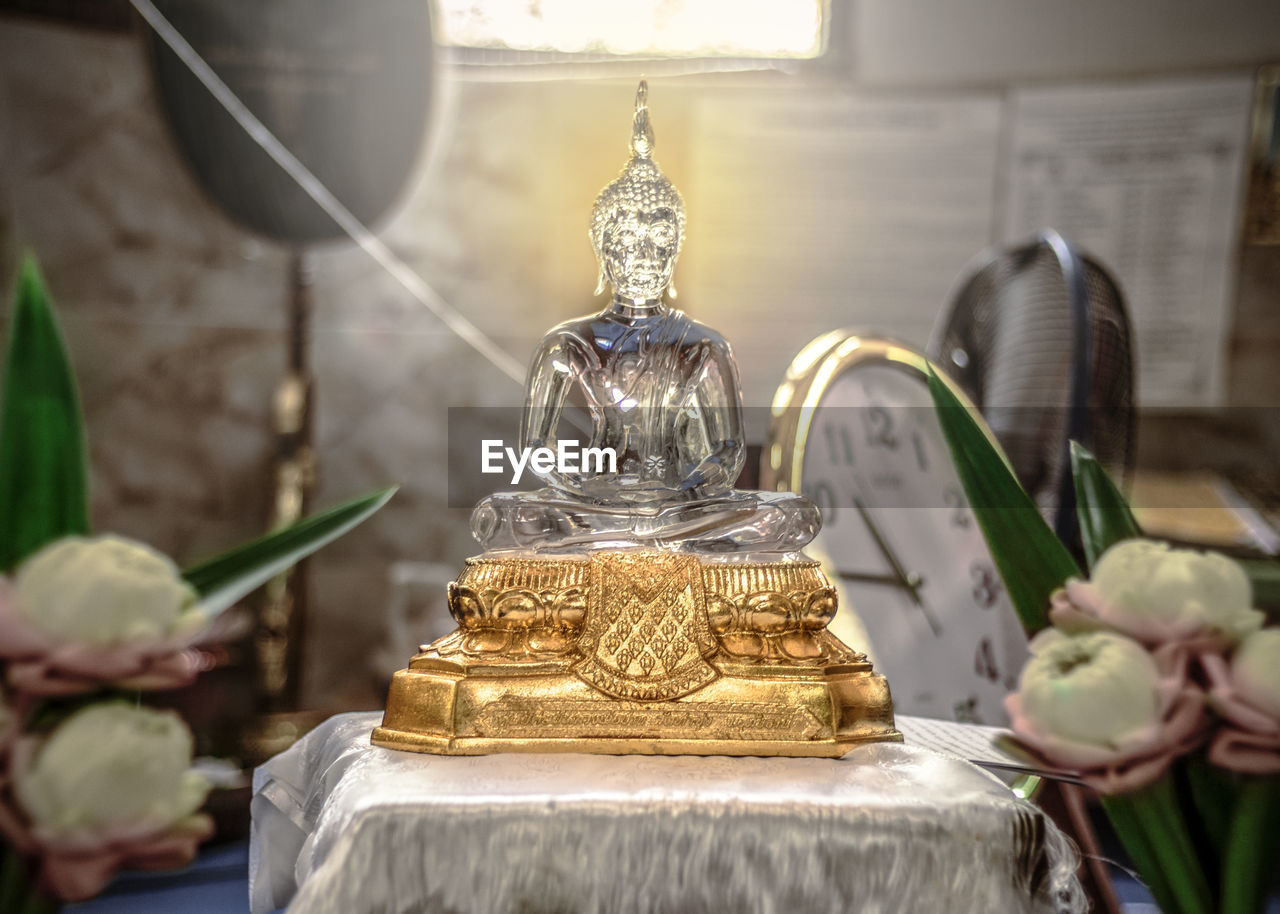 Close-up of buddha statue in temple