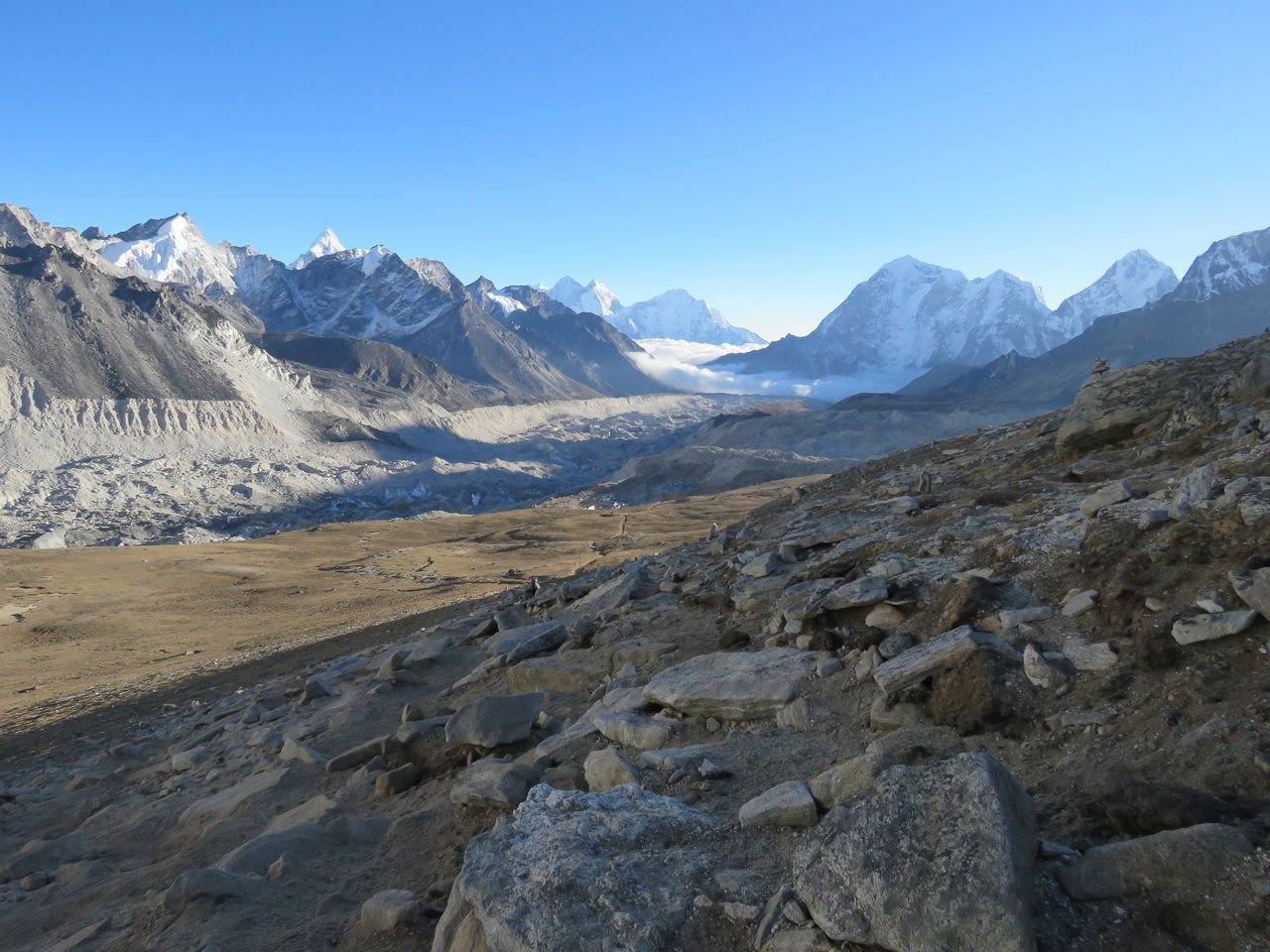 Scenic view of mountains against clear blue sky