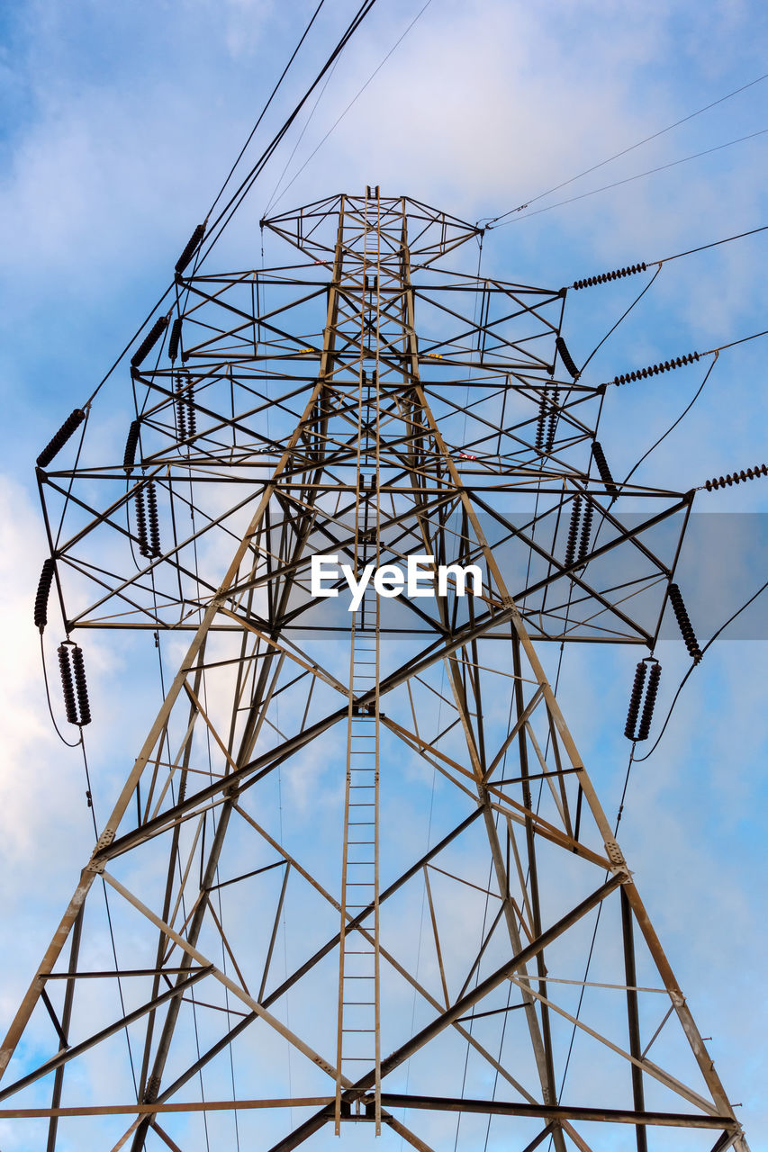 LOW ANGLE VIEW OF ELECTRICITY PYLON