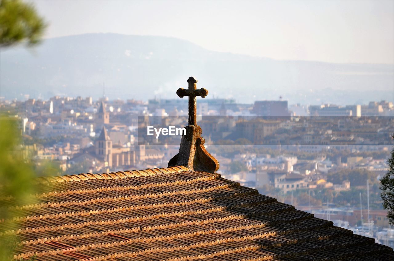 City on roof of building against sky