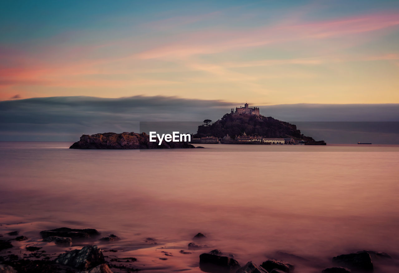 Scenic view of sea against sky during sunset