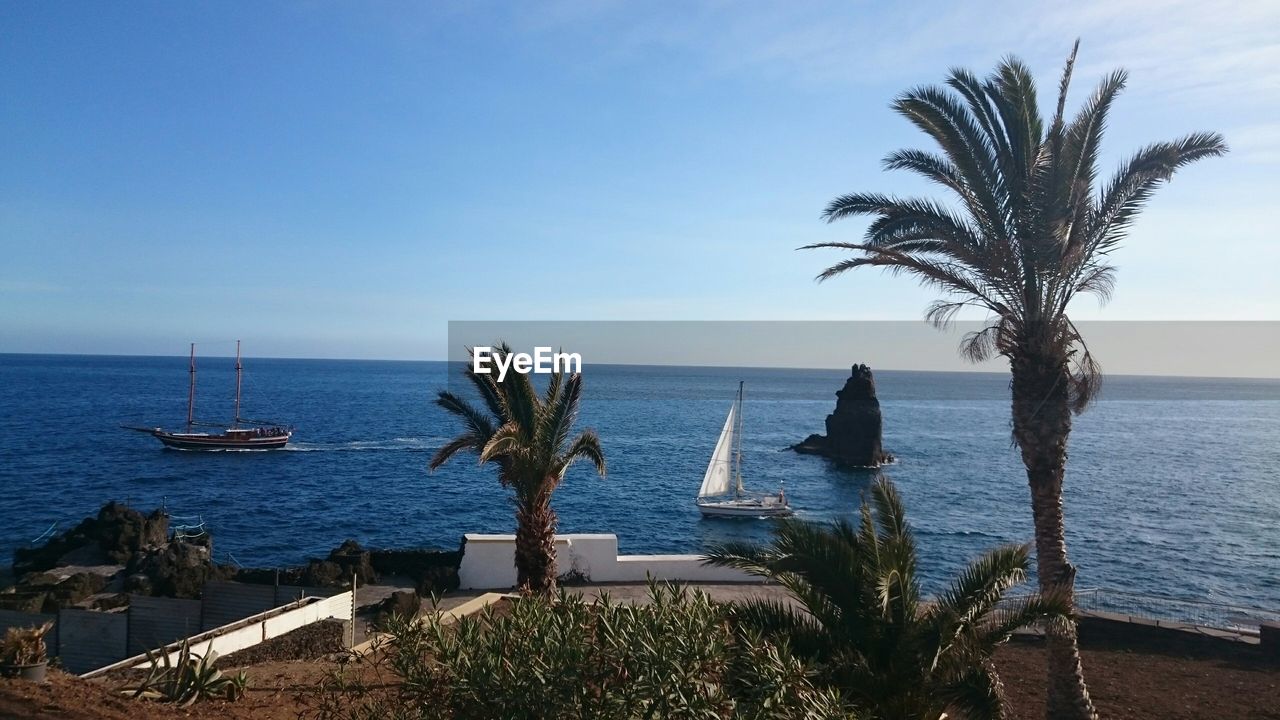 Scenic view of sea against clear sky