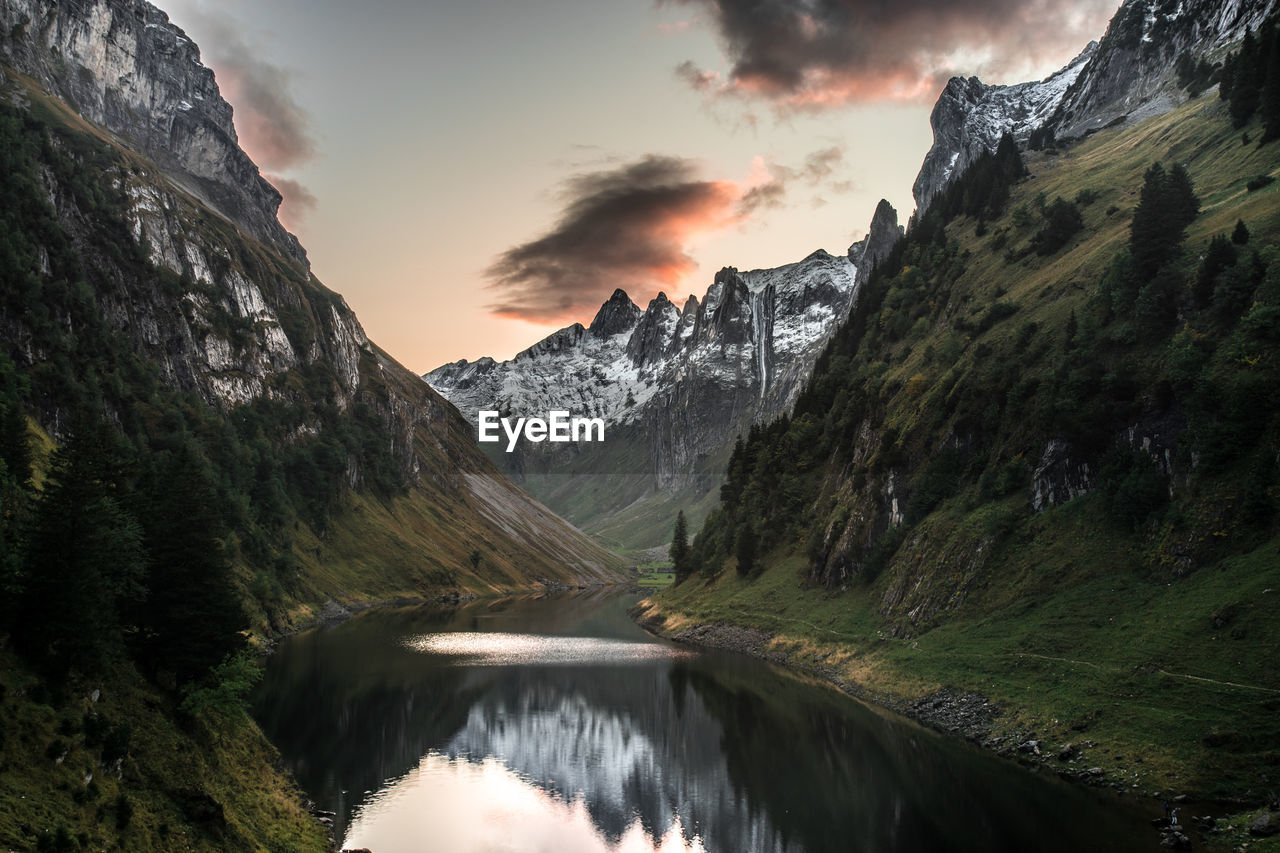 Scenic view of mountains against sky during sunset