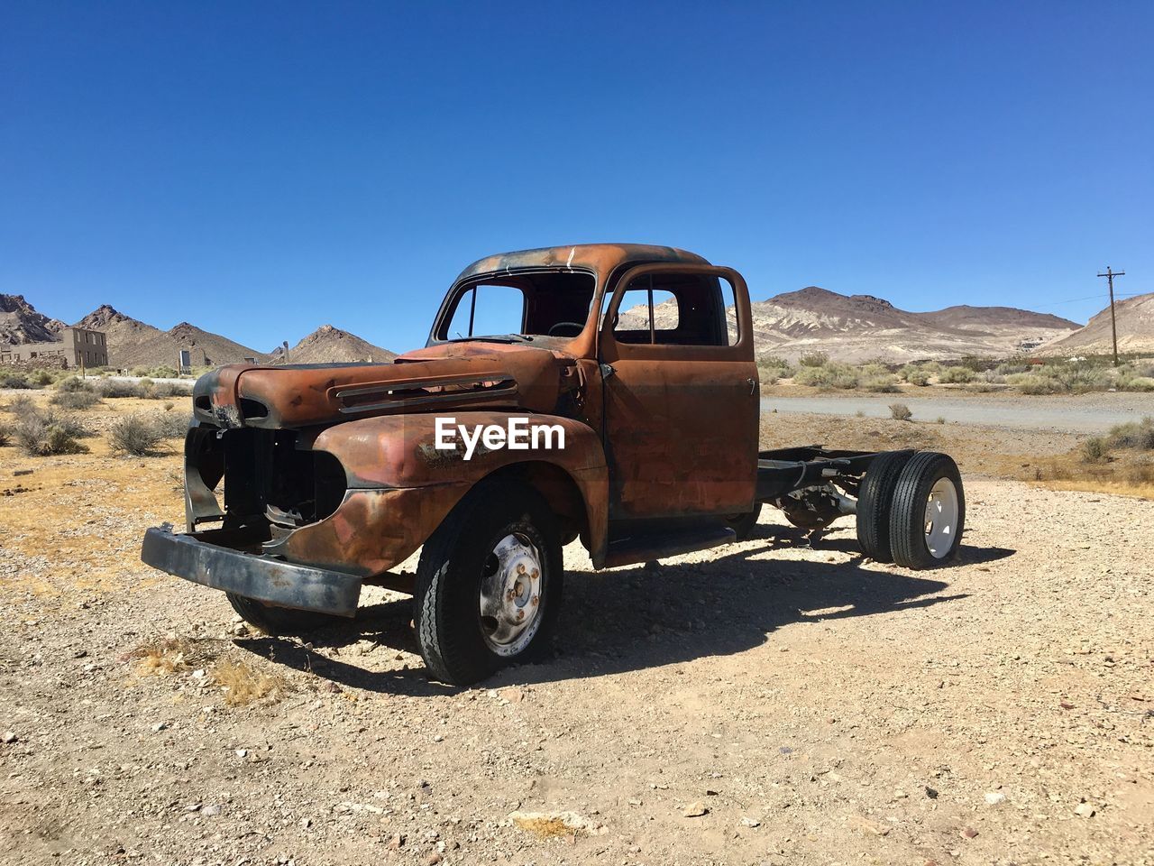 DAMAGED CAR ON DESERT