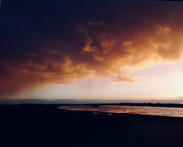 SCENIC VIEW OF DRAMATIC SKY OVER SEA