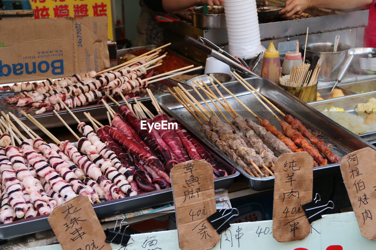 Variety of food for sale at market stall