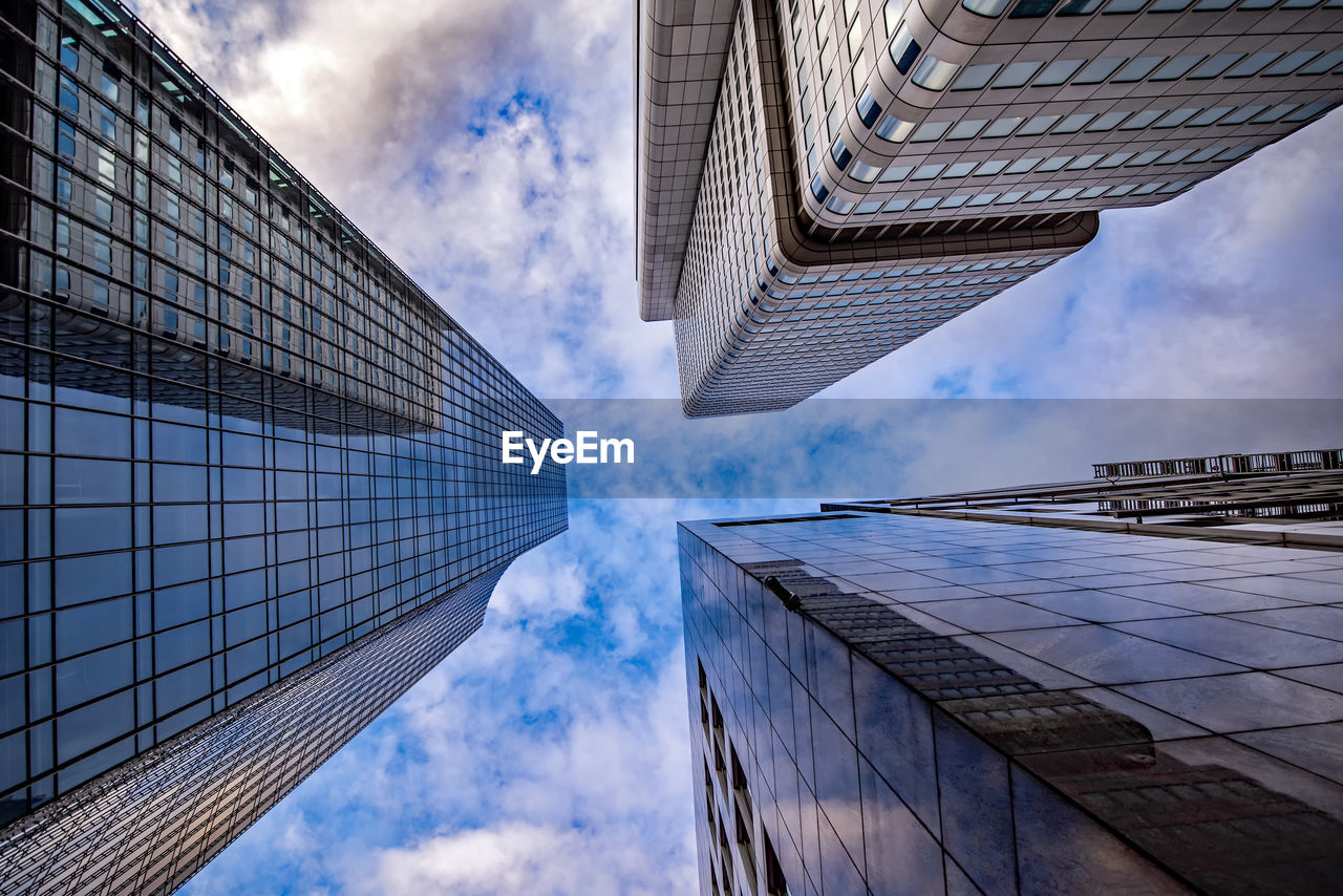 low angle view of skyscraper against sky