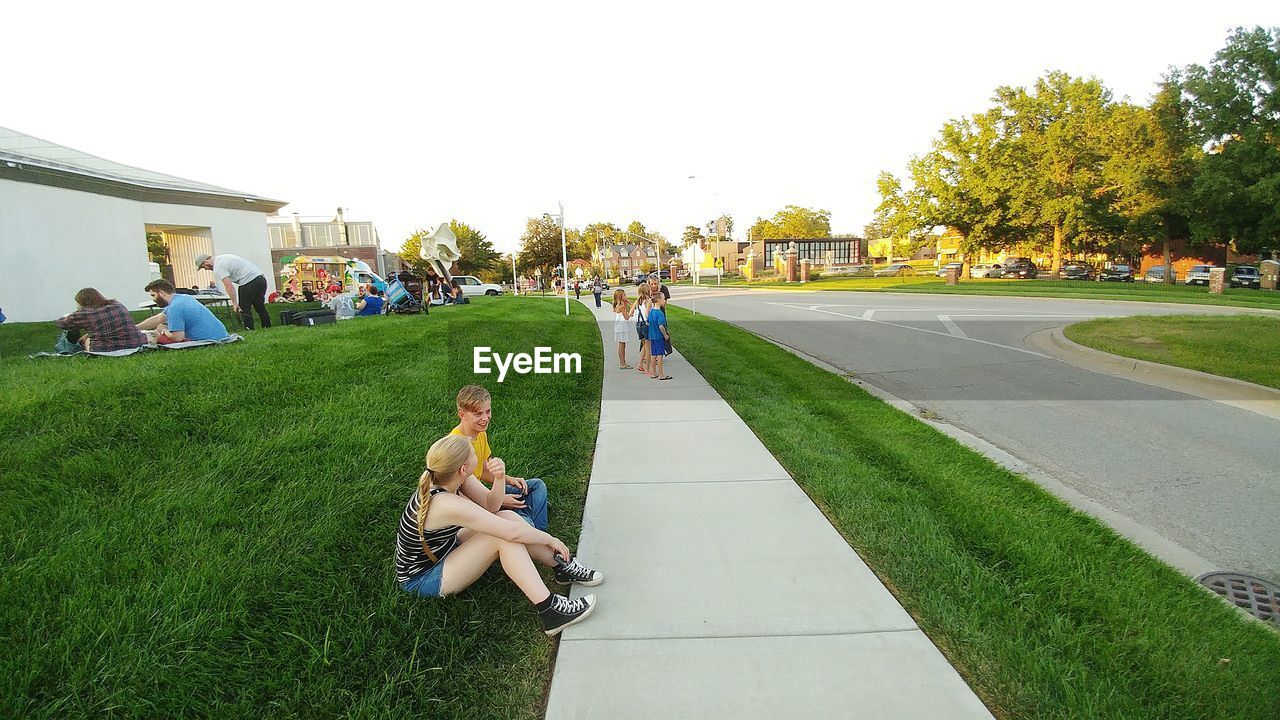 WOMEN SITTING IN PARK