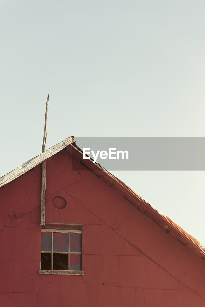 Low angle view of house against clear sky