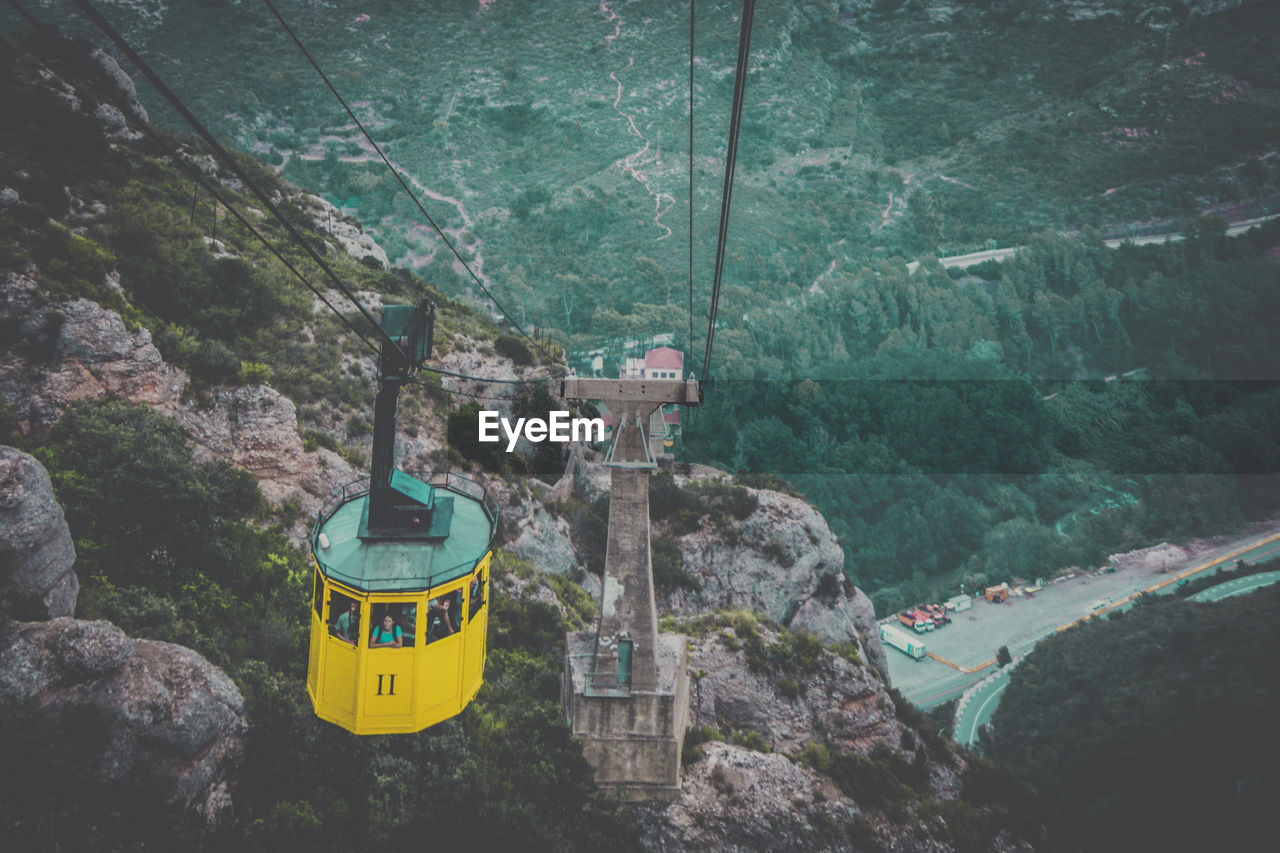 High angle view of overhead cable car against mountains