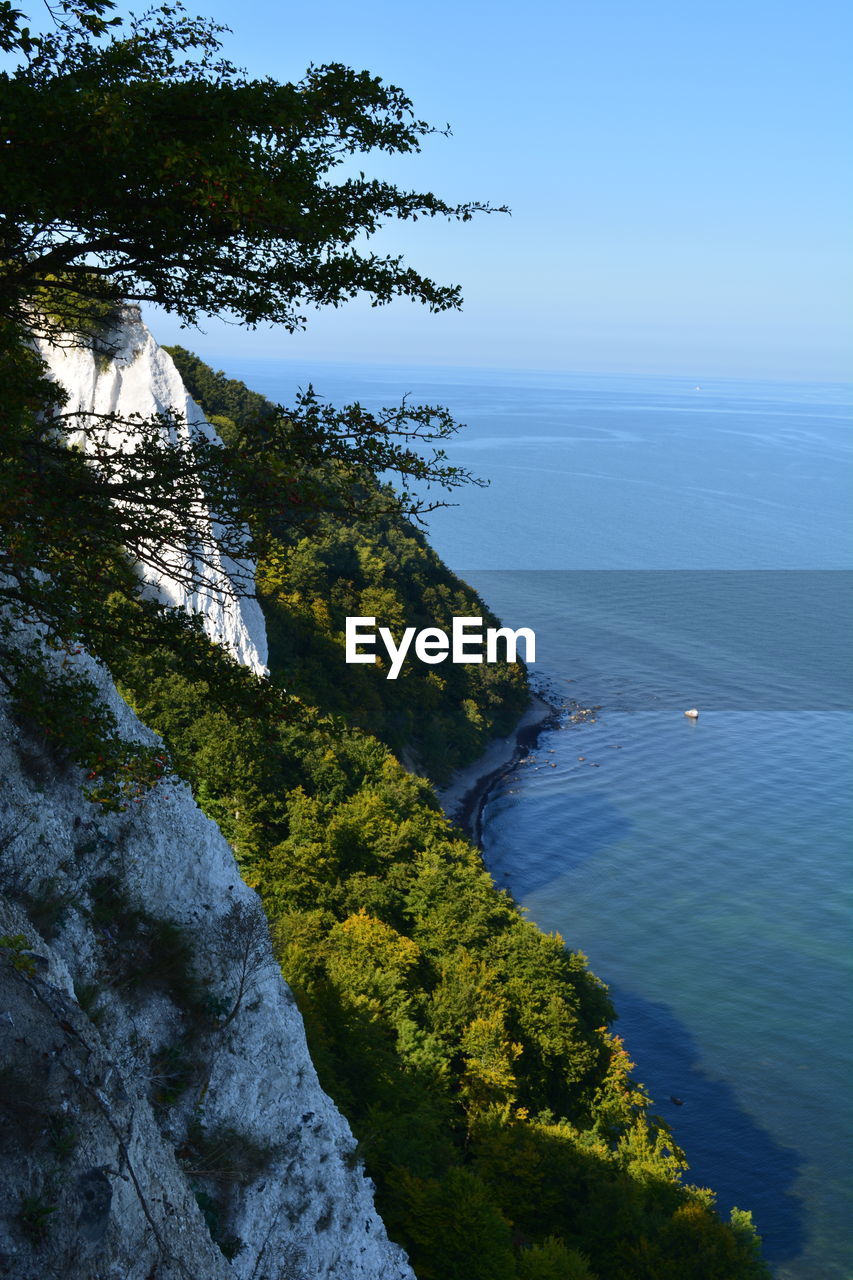 CLOSE-UP OF SEA AGAINST BLUE SKY