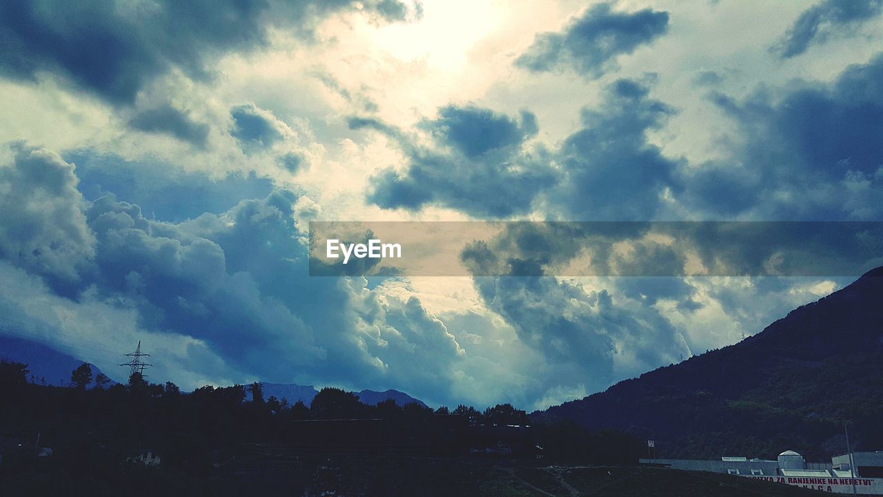 SCENIC VIEW OF CLOUDY SKY AT SUNSET