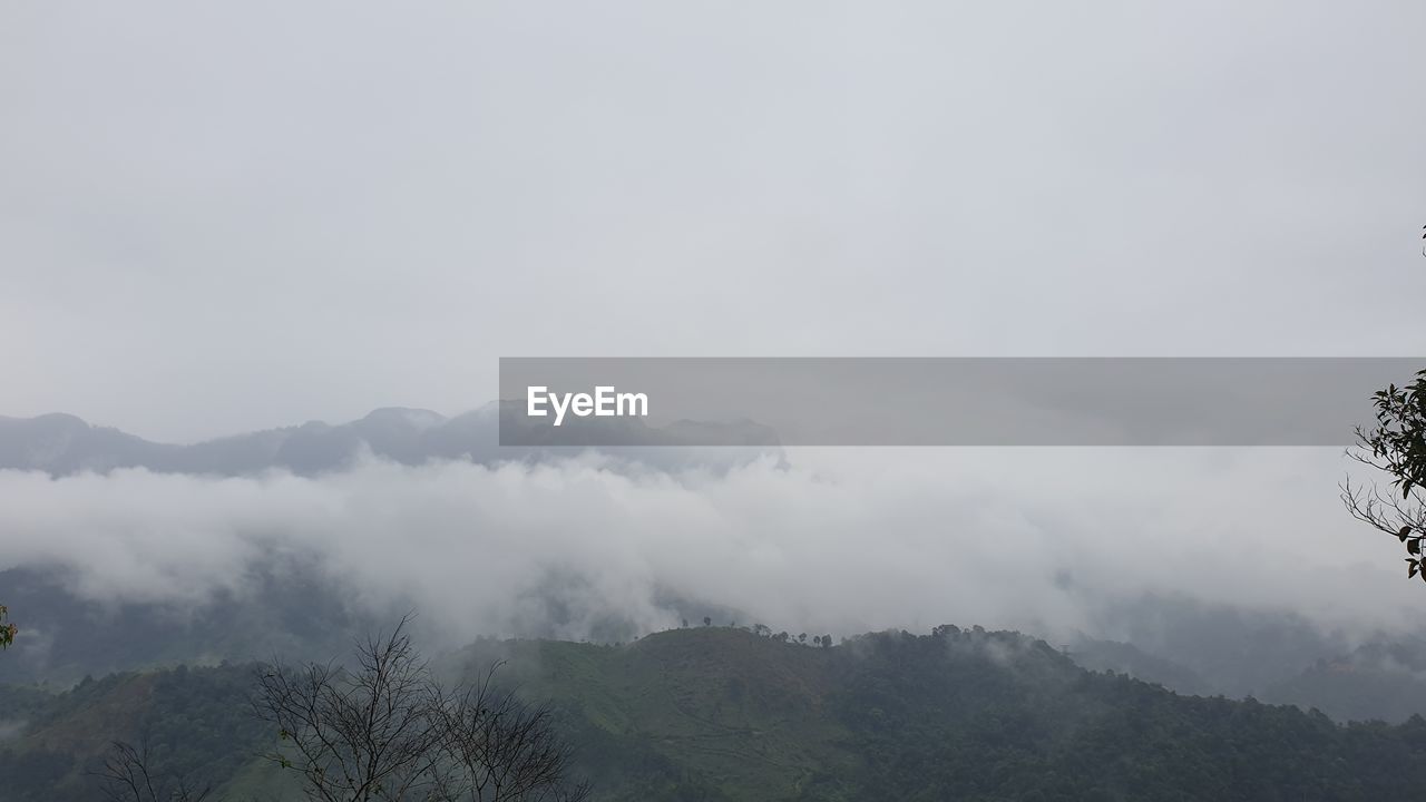 SCENIC VIEW OF MOUNTAIN AGAINST SKY