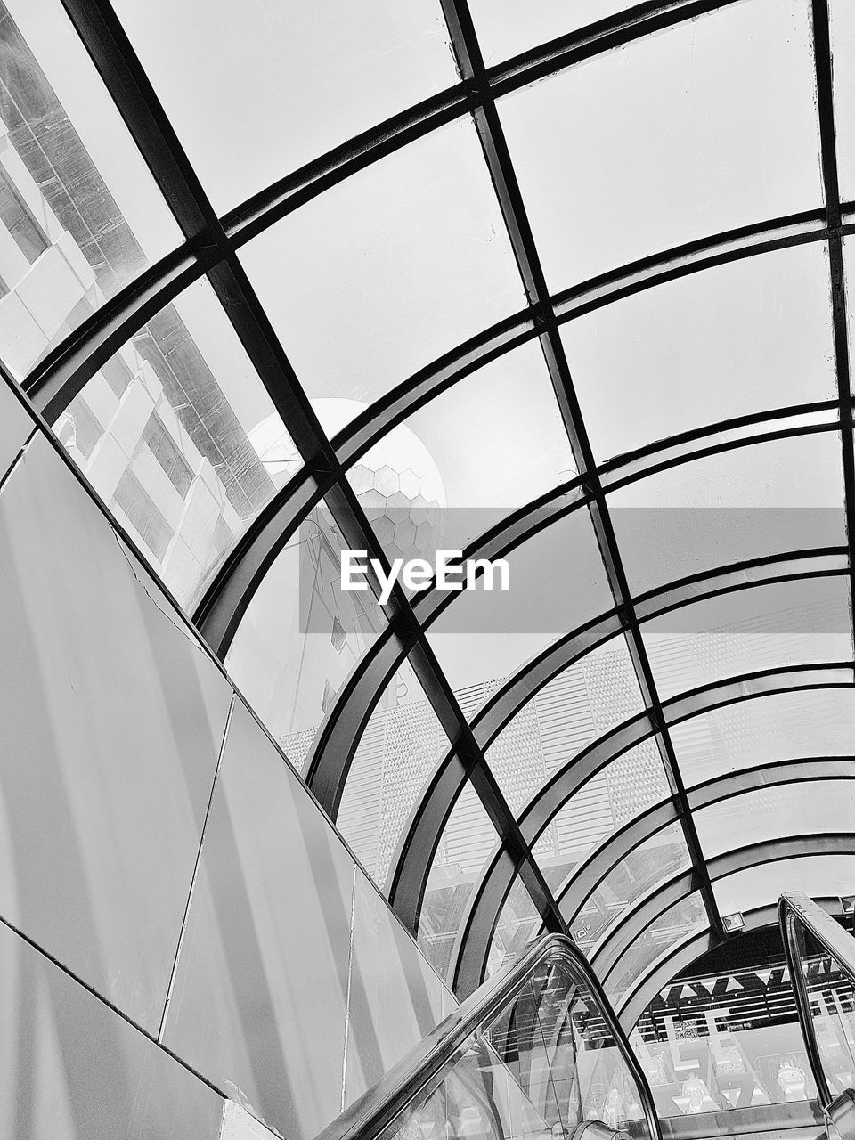 LOW ANGLE VIEW OF BUILDING SEEN THROUGH SKYLIGHT