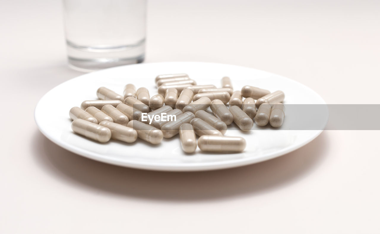 high angle view of pills in plate