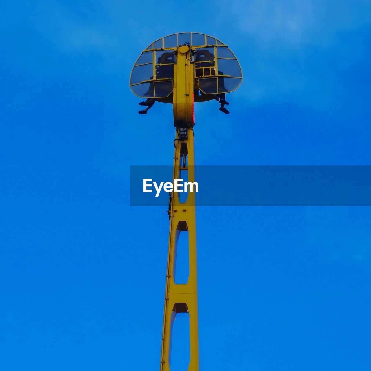 LOW ANGLE VIEW OF ROLLERCOASTER AGAINST SKY