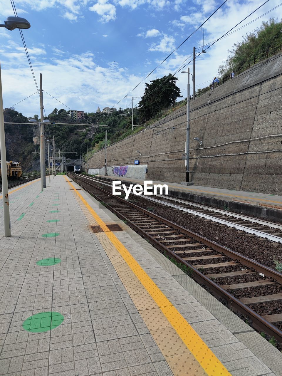 Railroad station platform against sky