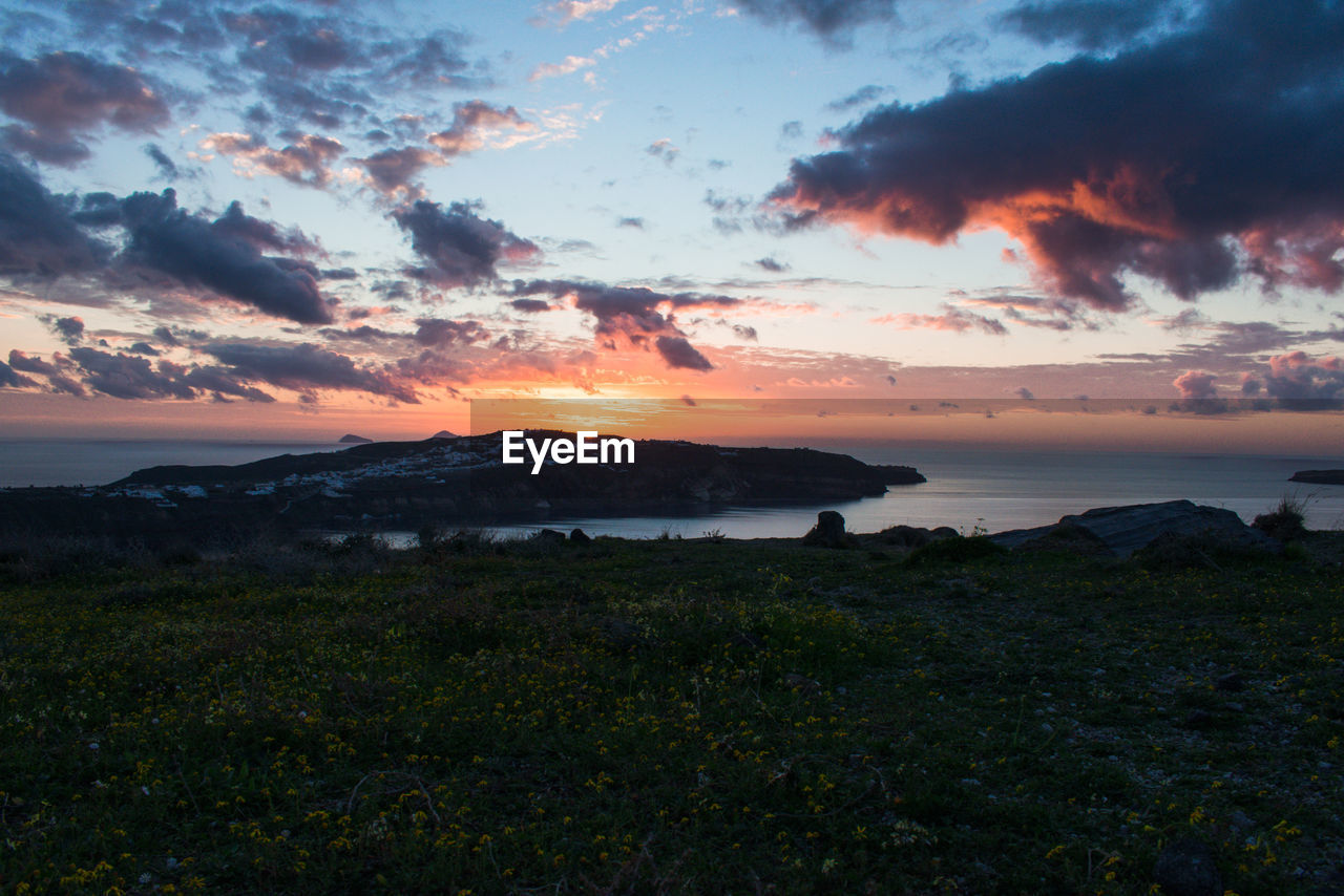 SCENIC VIEW OF SEA DURING SUNSET